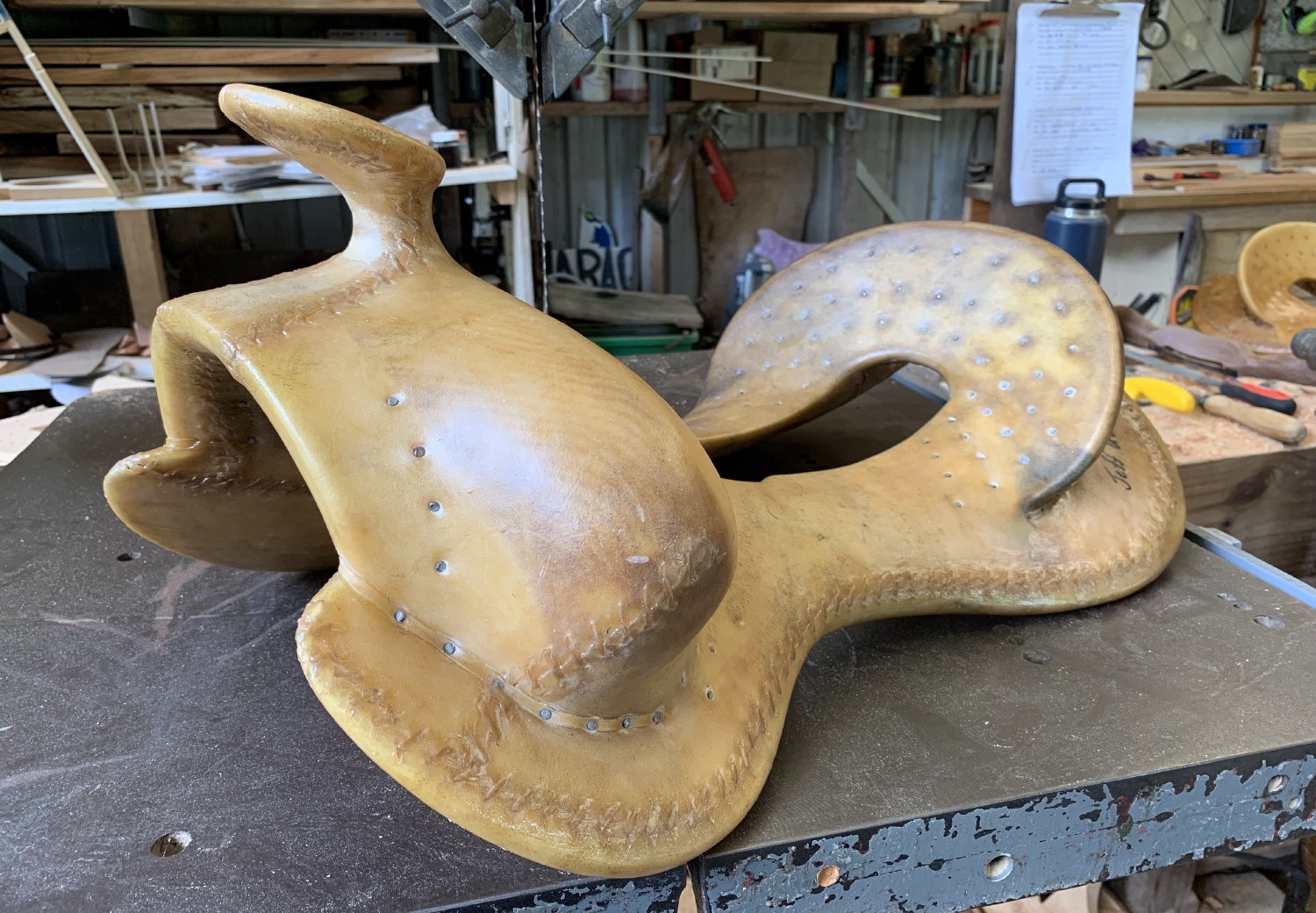 Finished rawhided wooden saddle tree