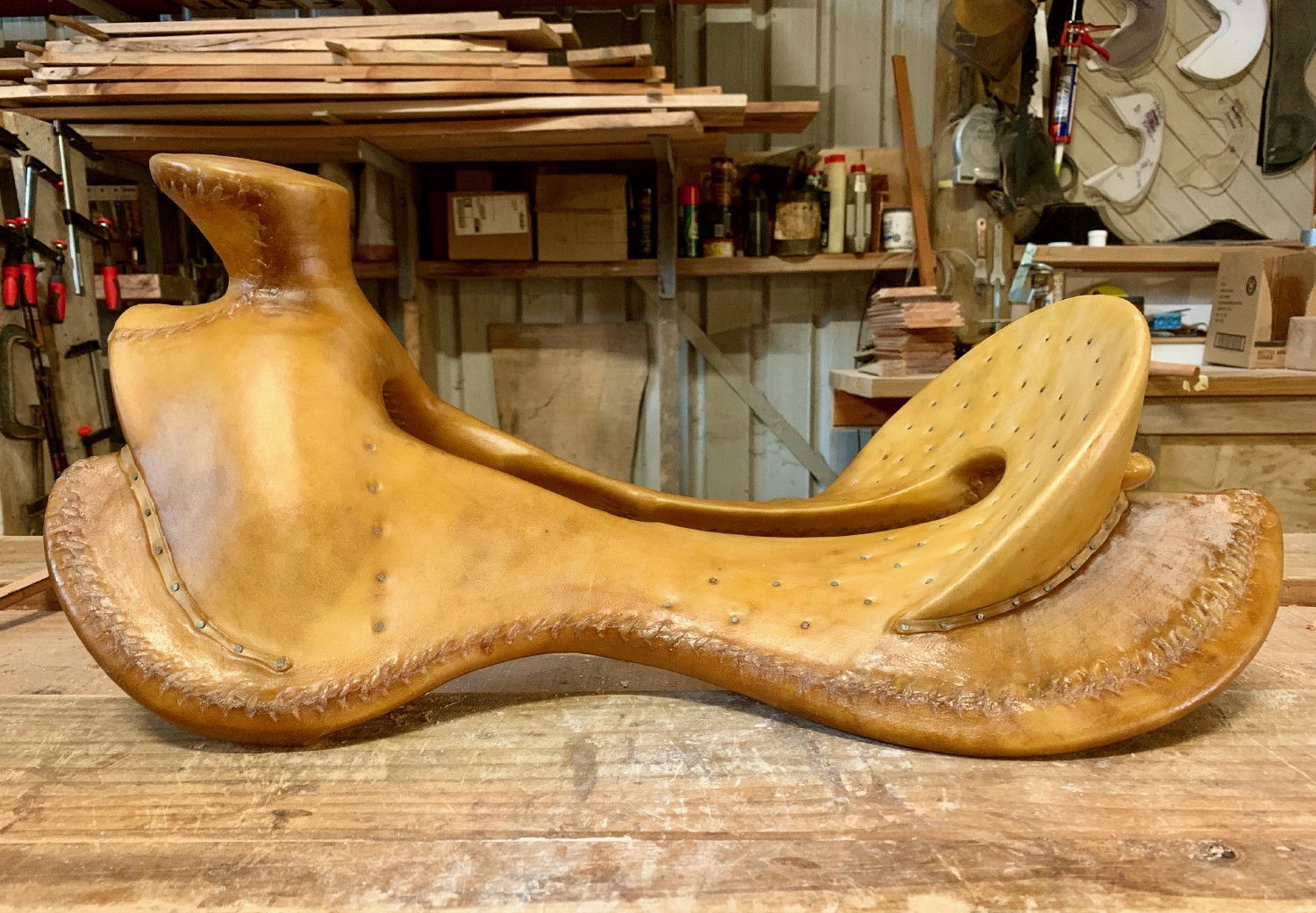 Finished rawhided wooden saddle tree